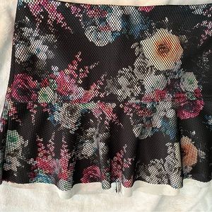 Fun 80s early 90 grunge/punk re-pop fishnet skirt!